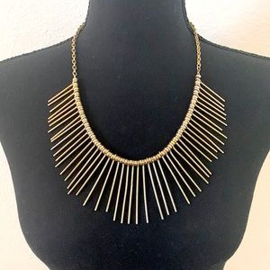 Gold, spiked necklace